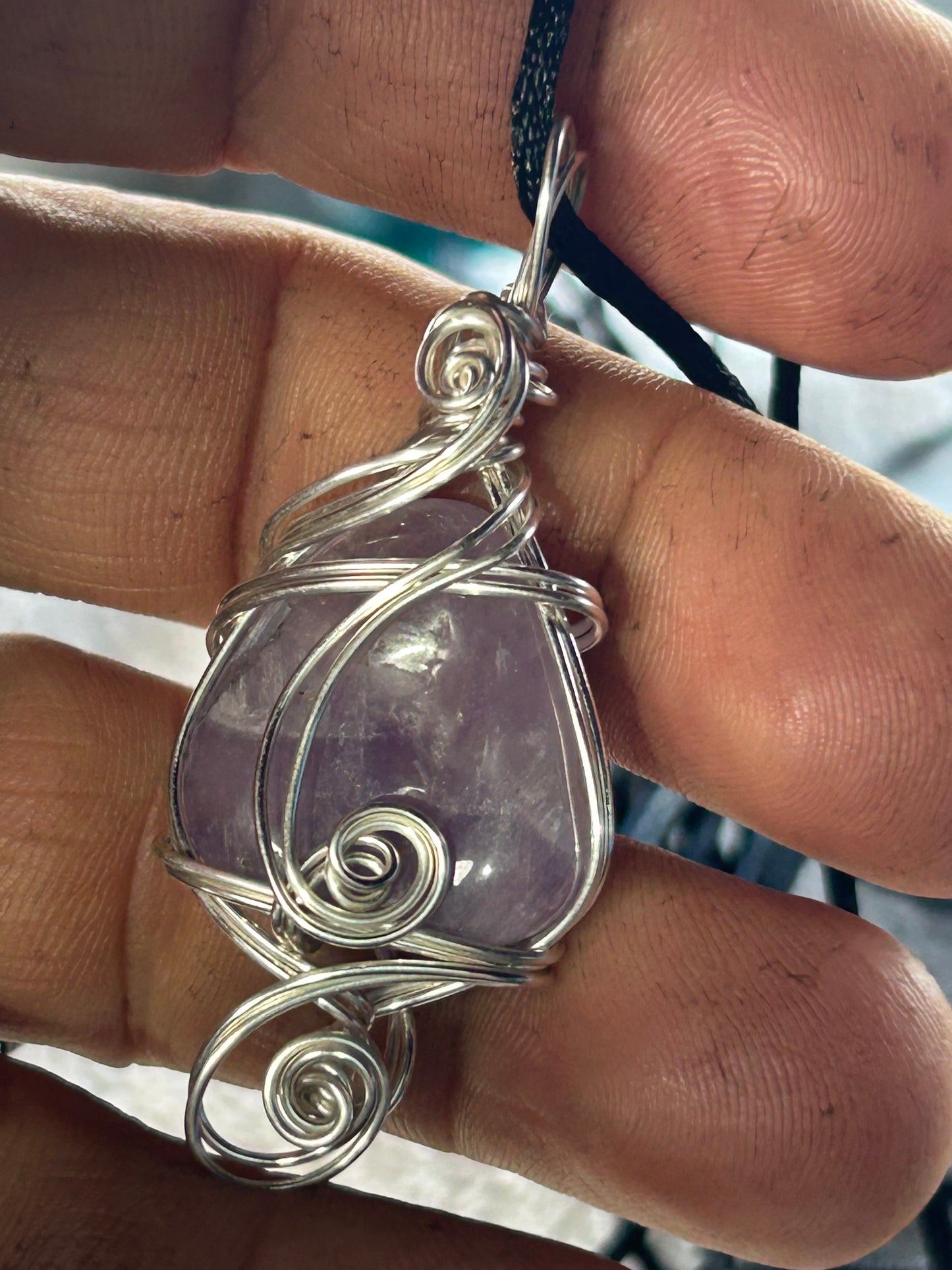 Amethyst pendant in silver plated wire