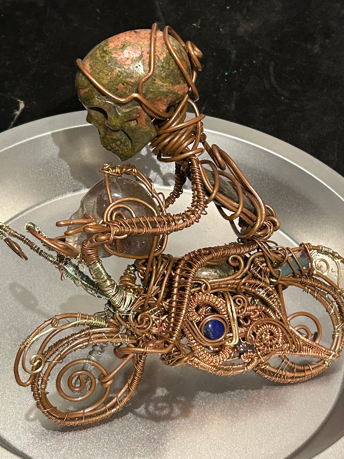 Harley Davidson gem and copper motorcycle rider
