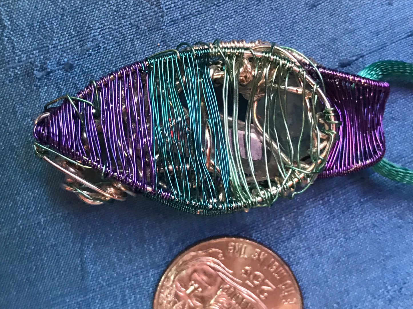 Mini tourmaline crystal spaceship pendant