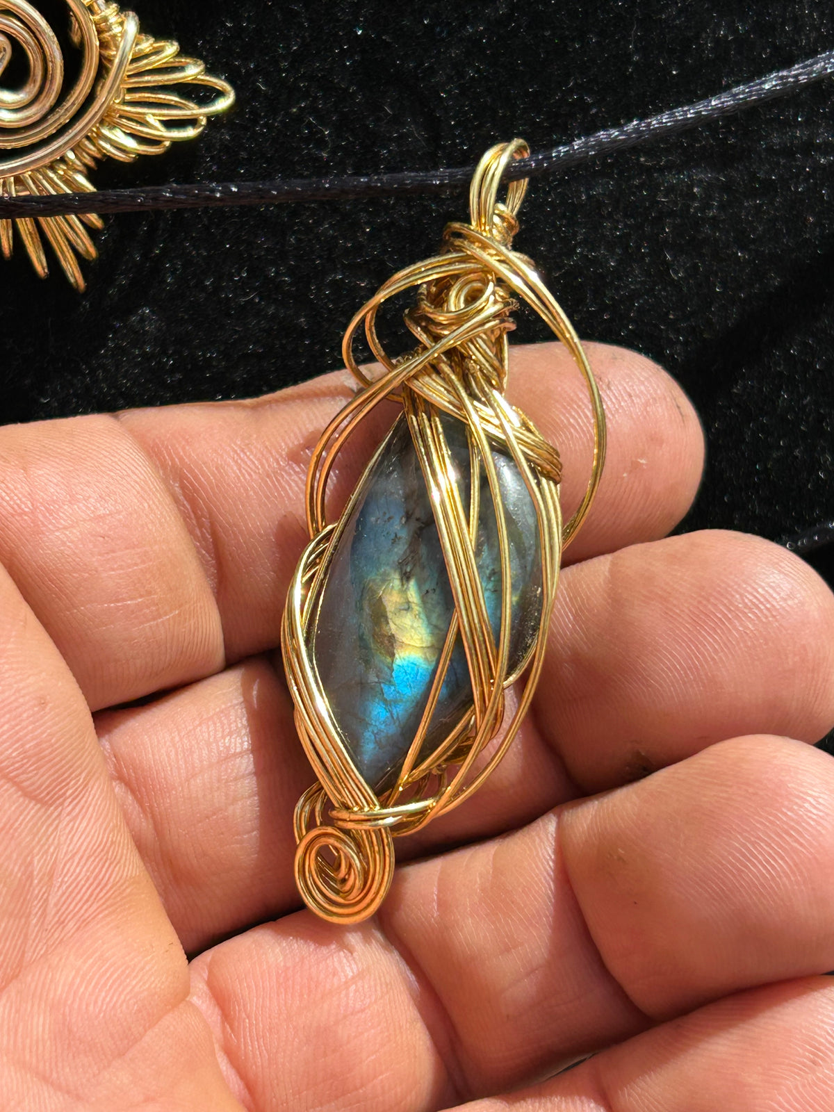 Labradorite pendant infused with aurora borealis