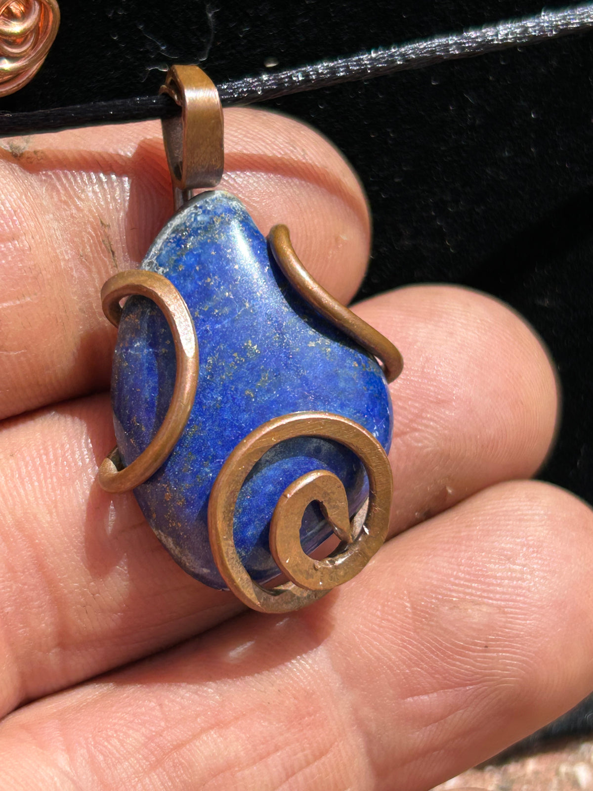 Lapis lazuli copper wrapped pendant stone of royalty and True communication