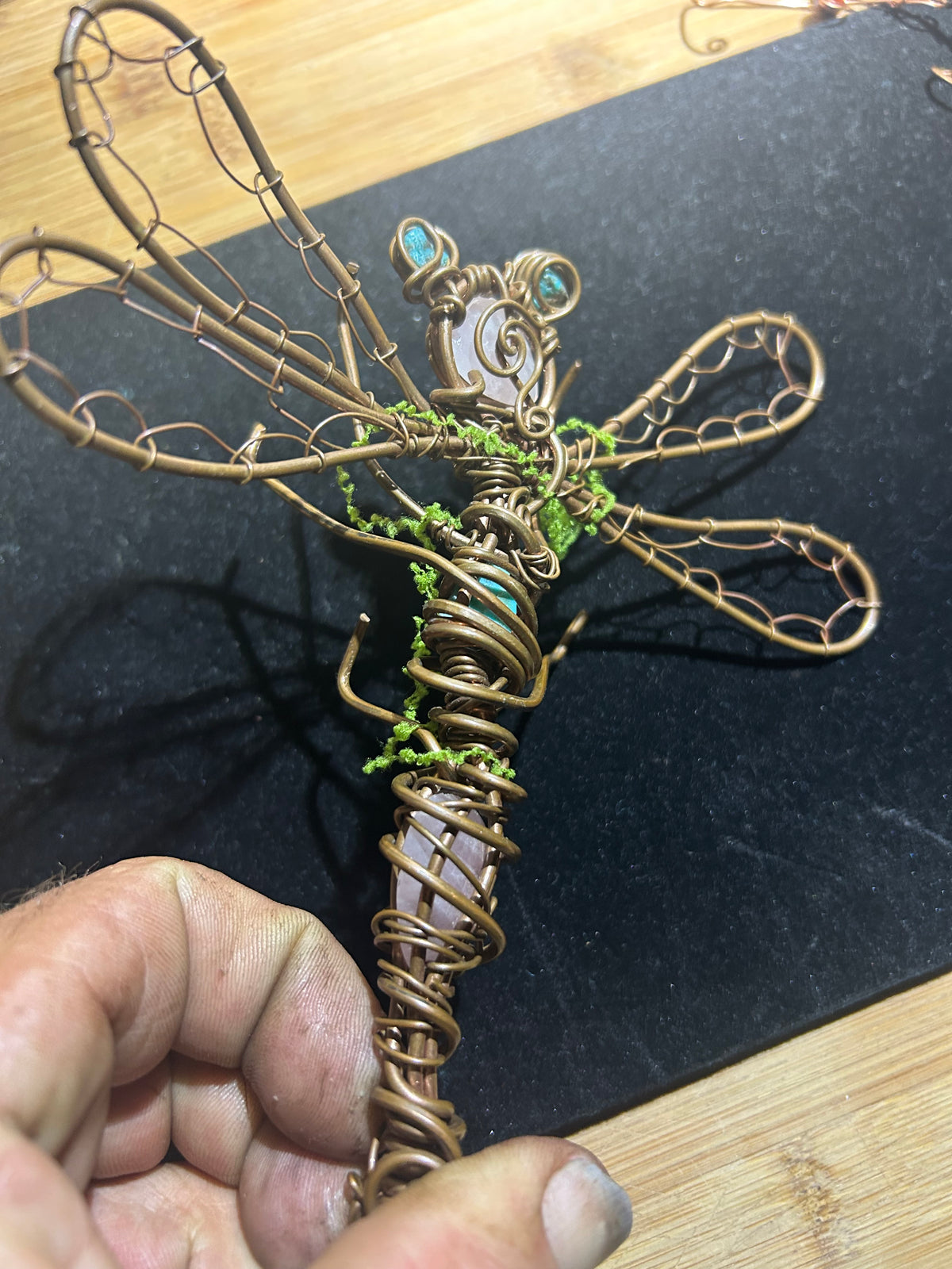 Dragonfly art made out of copper and crystals for inspiring you to get through your workday 