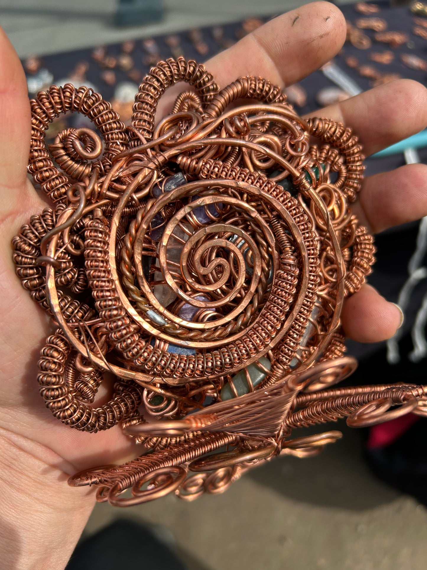 Copper and gems spiral together in a magical toroidal vortex flow to attract your wealth