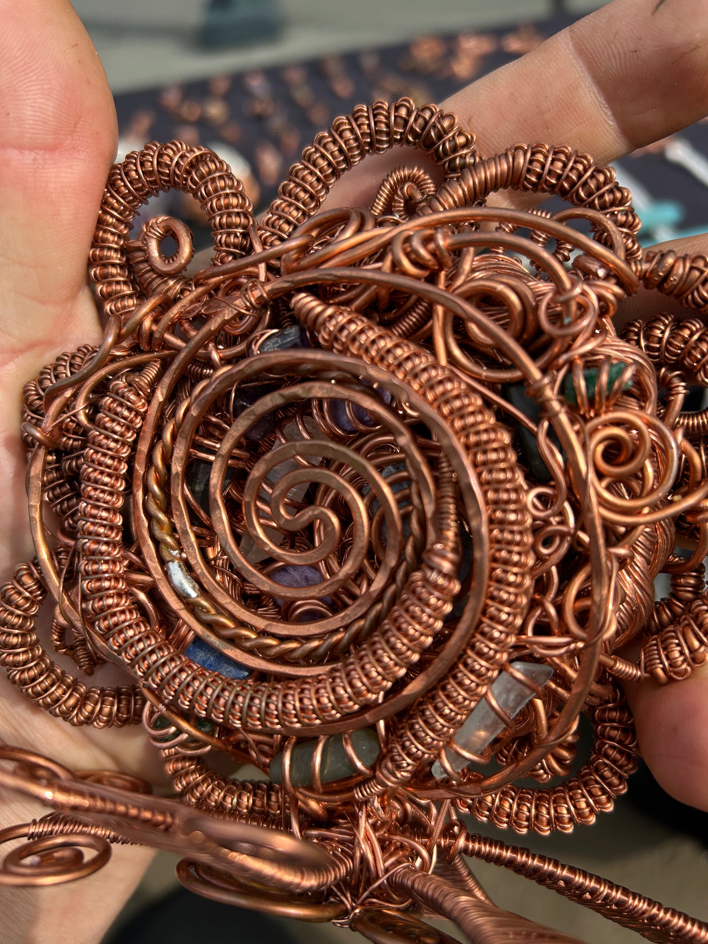 Copper and gems spiral together in a magical toroidal vortex flow to attract your wealth