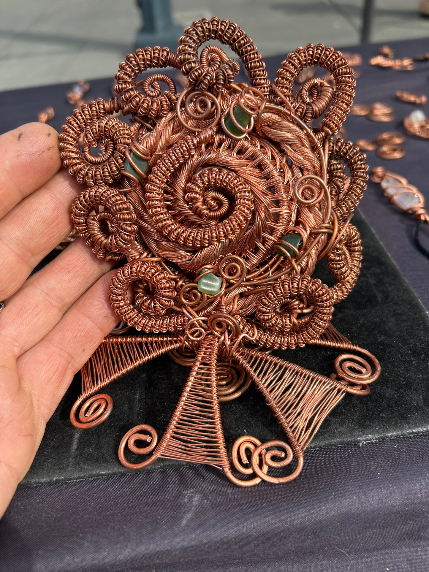 Copper and gems spiral together in a magical toroidal vortex flow to attract your wealth
