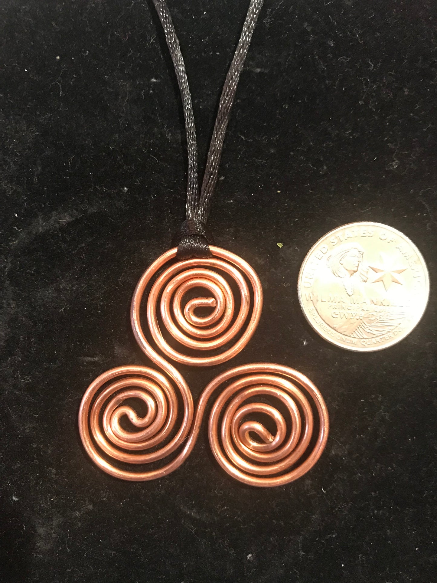 Copper triskelion