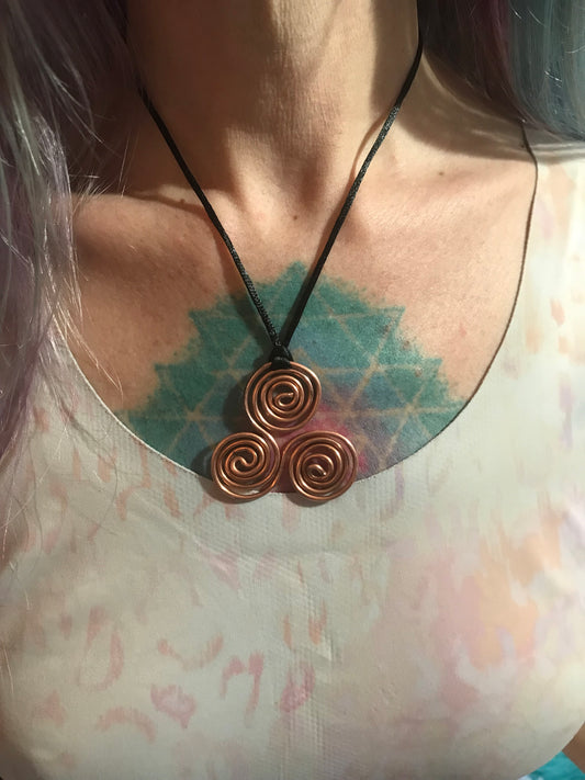Copper triskelion