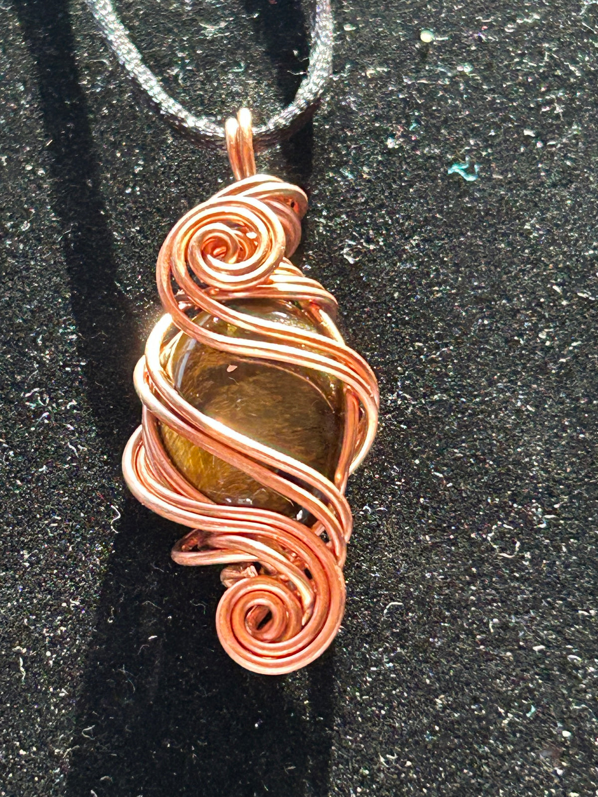 Tigers eye necklace pendant wrapped in copper