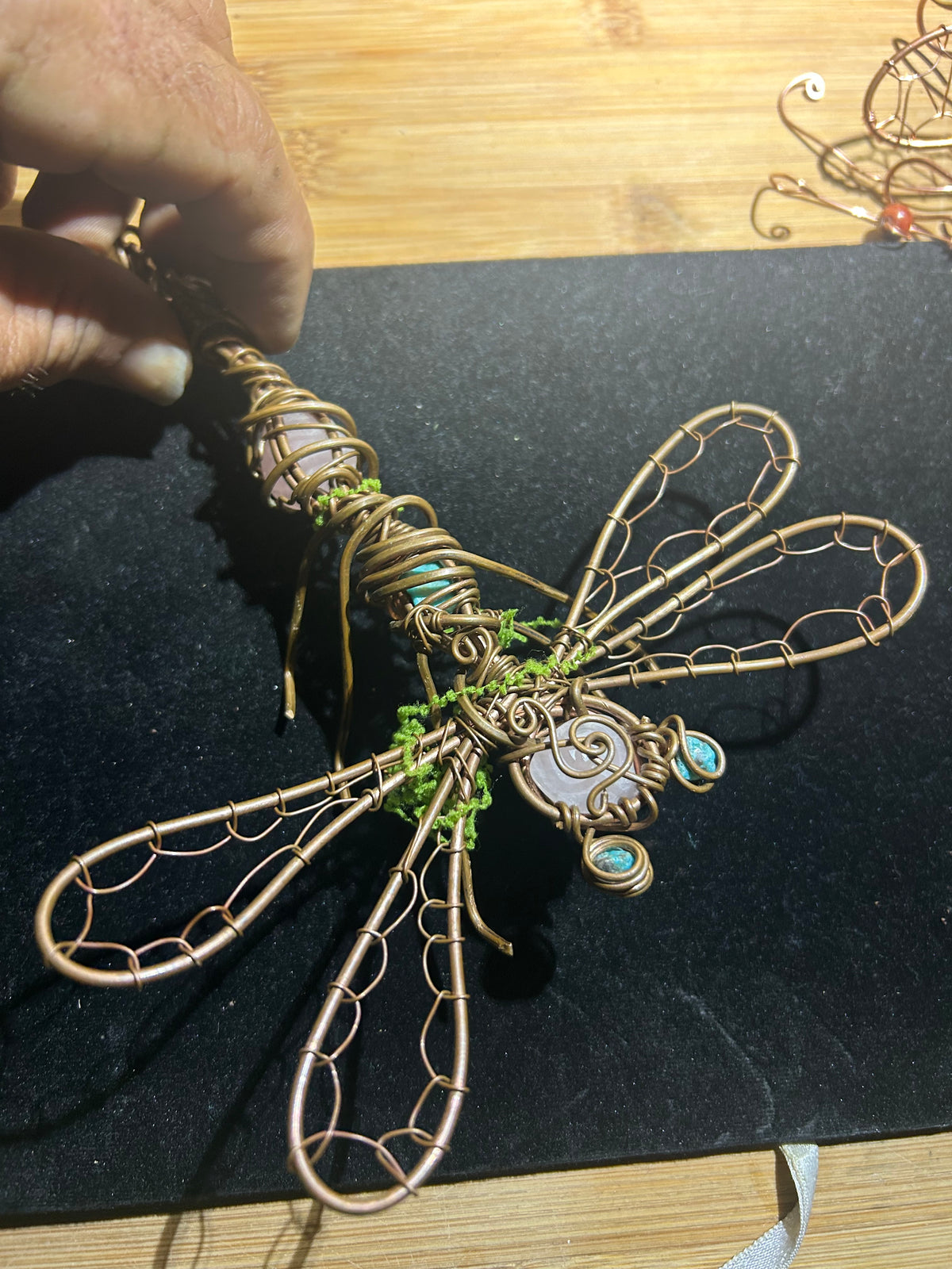 Dragonfly art made out of copper and crystals for inspiring you to get through your workday ￼