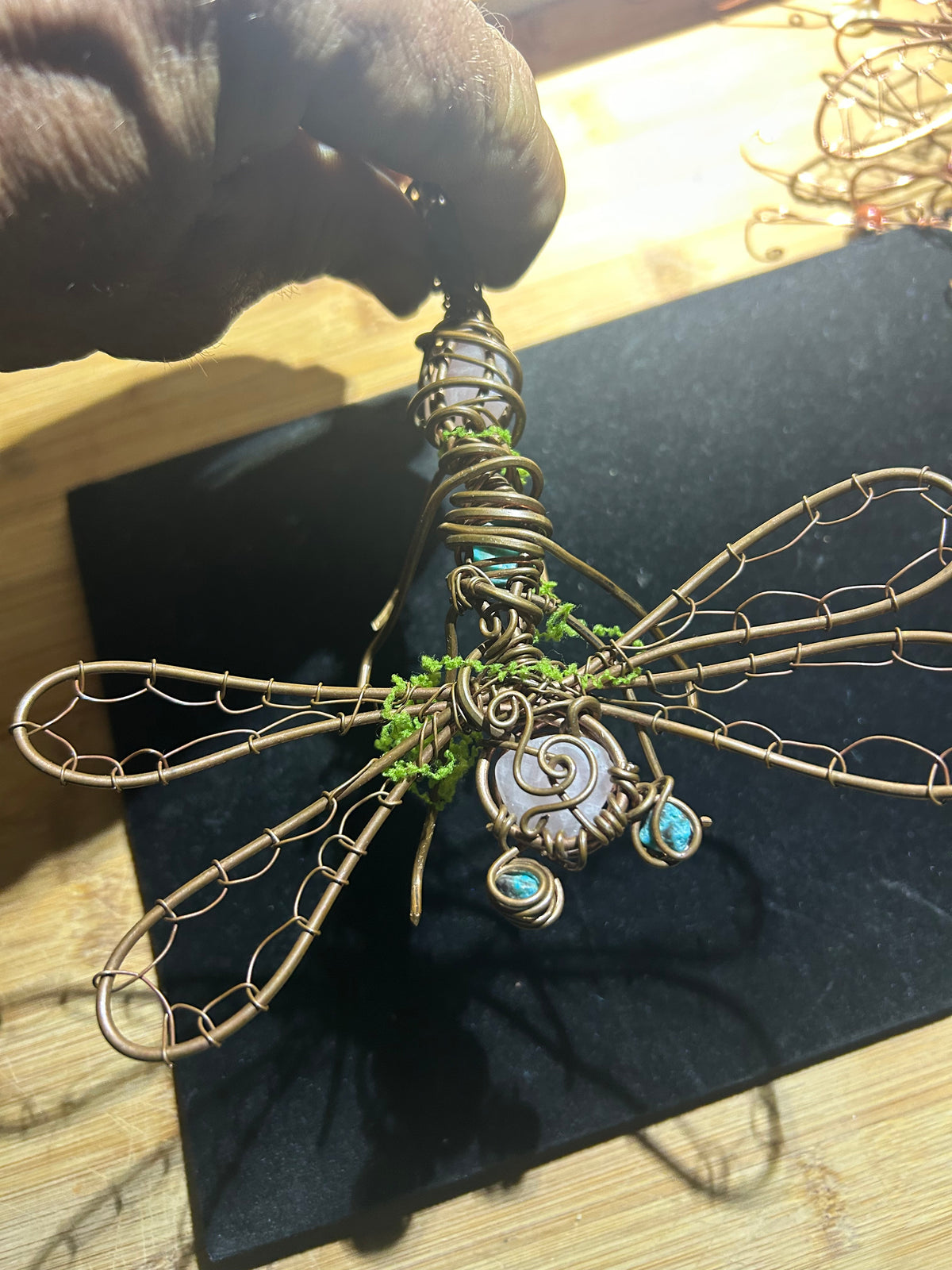 Dragonfly art made out of copper and crystals for inspiring you to get through your workday ￼